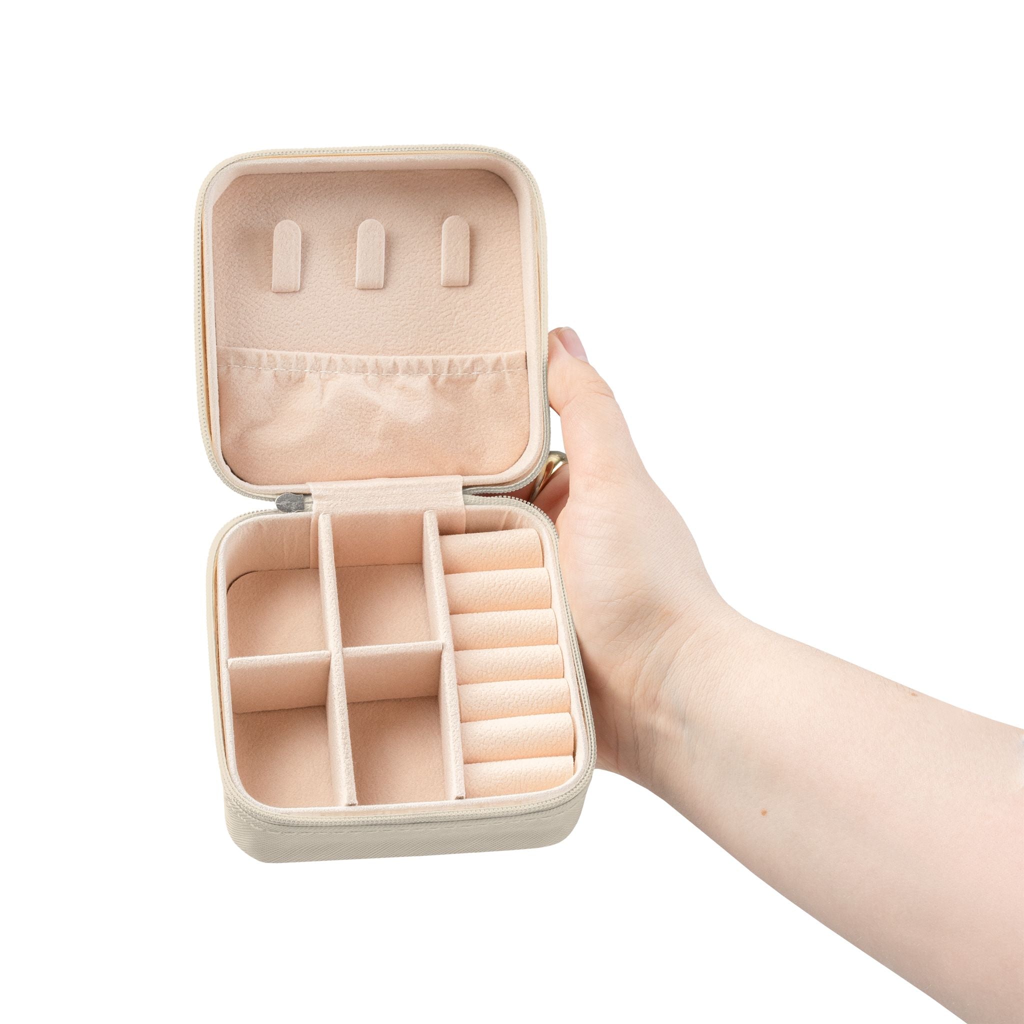 Compact travel jewellery box for organising jewellery while travelling
