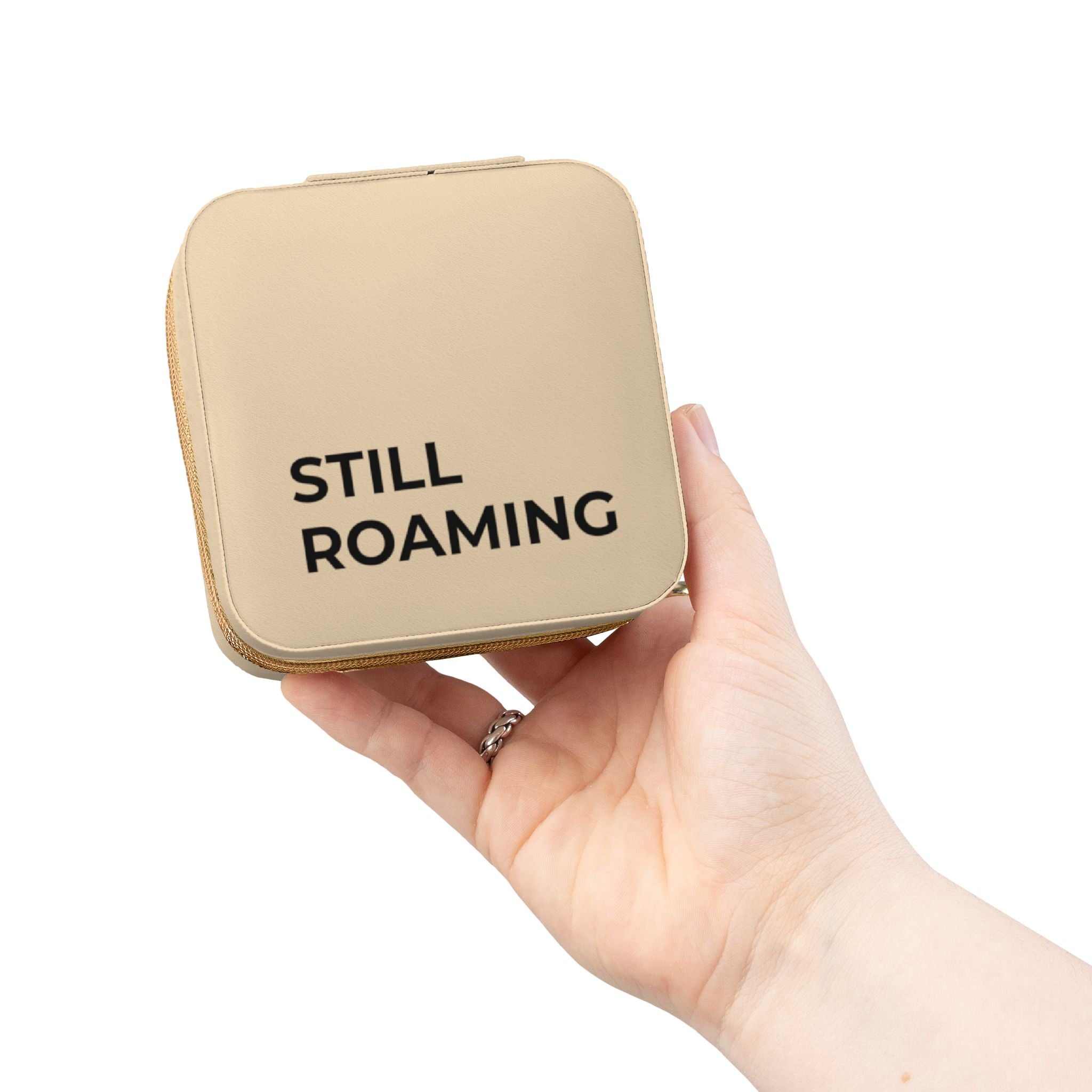 Compact travel jewellery box for organising jewellery while travelling
